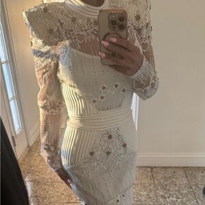 Zhivago white dress with gold details in size 4. I only wore once for 2 hours.